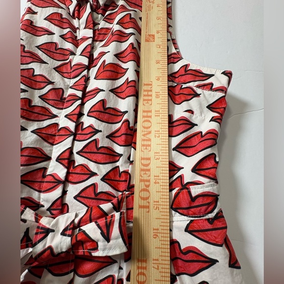 Anthropologie Red Smooch Dress. All Over Red Lip Design. Button Front. Pockets. - Picture 15 of 16